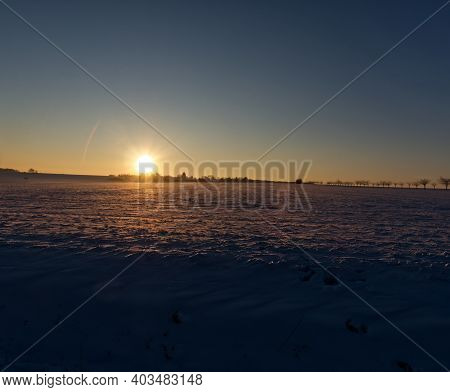 Sunset In Thuringia With Snow At Krippendorf In Winter