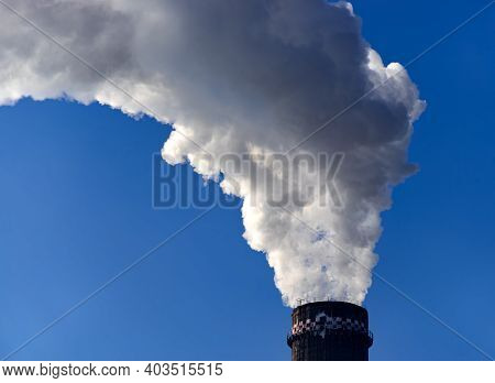 Bucharest, Romania - January 15, 2021: Chimney Of Cet Progresul Power Plant, Pollute With Smoke From