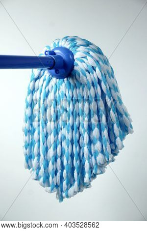 Rope mop in blue. Microfiber mop. House cleaning.