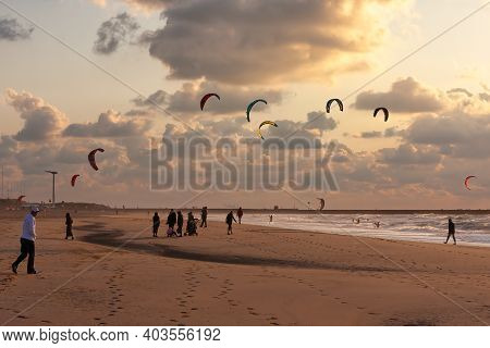 Scheveningen, The Netherlands - September 29, 2008: Kite Surfing In The Sunset At The Beach Of Schev