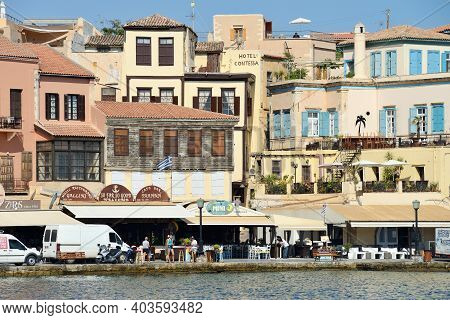 Chania, Greece - August 12: City Buildings At Harbor Of Chania, Greece On August 12, 2014. Chania Is