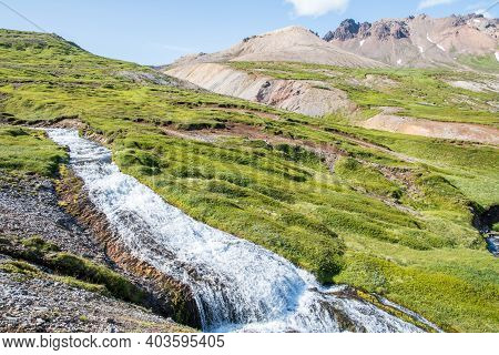 Cascade Range In River In Breidavik In East Iceland