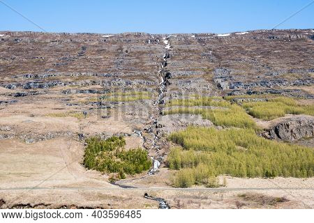 Waterfall Range In The Hills Of Fljotsdalur Valley In East Iceland