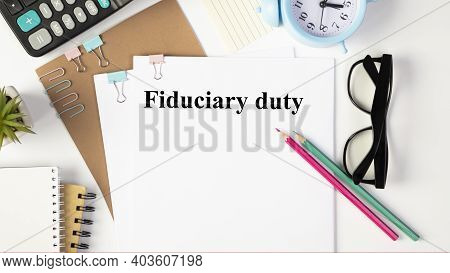 Paper With Fiduciary Duty On A Table