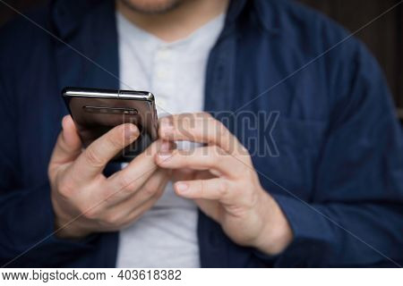 Man Using His Smartphone, Detail Of Hands.