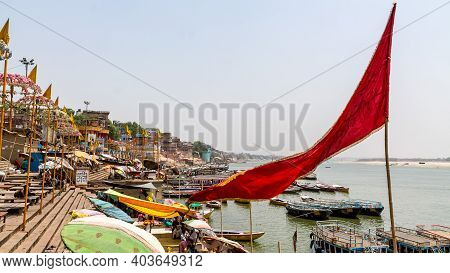 Varanasi, India - May 06, 2019 - A View Of Historic Varanasi Ghats, Ancient Temples And Buildings Al
