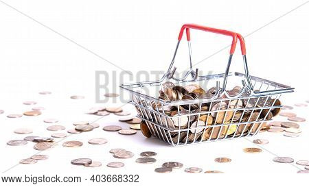 Metal Basket With Metal Money Coins On White Background - Multicurrency Basket Concept