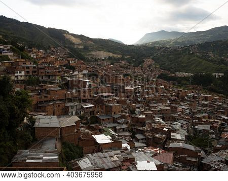 Panorama Cityscape Of Colorful Brick Houses In Comuna 13 San Javier Neighborhood Poverty Slum In Med