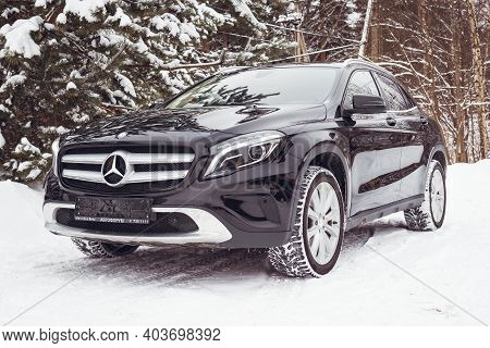 MOSCOW, RUSSIA-JANUARY 10, 2021: Mercedes Benz GLA 250 on a snow-covered street outside the city.