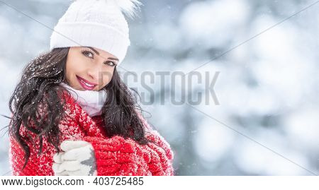 Happy Woman Rests Her Arms On The Chest Covered In Snowfall While Wearing Winther Knitted Outwear Ou