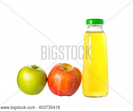 Glass Bottle With Apple Juice And Two Red And Green Apples. Harvest Concept, Healthy Food And Health