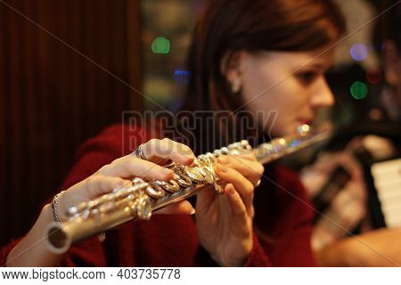 Flute Player Girl Play Some Music During Vacation Or Christmas