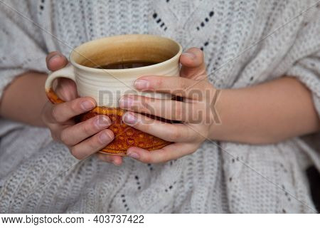 Young Woman Holding Mug Of Tea. Autumn Or Winter Moody Weekend. Lazy Day, Quarantine, Stay Home, Cos