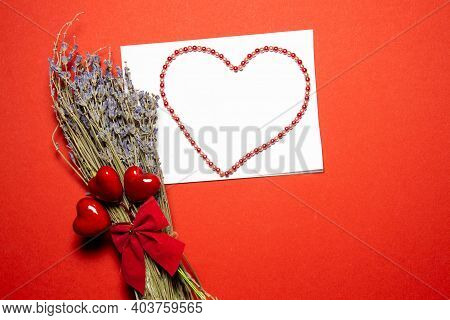 Valentines Day Congratulation. Red Rose And Greeting Card With Heart Sign On Black Background Top Vi