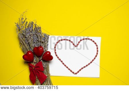 Valentines Day Congratulation. Red Rose And Greeting Card With Heart Sign On Yellow Background Top V