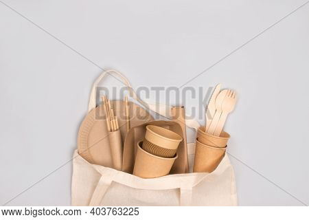 Eco-friendly Tableware - Kraft Paper Food Cups And Containers In Cotton Bag On Gray Background With 
