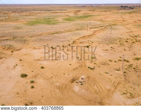 Water Well In The Desert Or Steppe. Place To Turn The Water Delivery Vehicle.