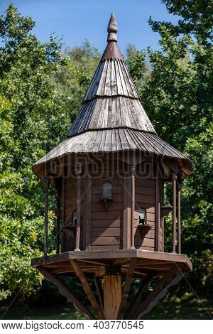 Old Wooden Dovecote In Rural Garden. Wygiezlow. Poland