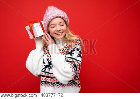Shot Of Attractive Positive Smiling Young Blonde Woman Isolated Over Colourful Background Wall Weari