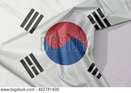 South Korea Fabric Flag Crepe And Crease With White Space, The White Color With Taegeuk And Black Tr