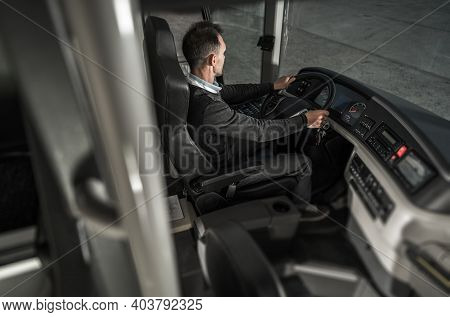 Public Transport Bus Driver Profession. Urban Commute Transportation. Caucasian Driver In His 40s Be