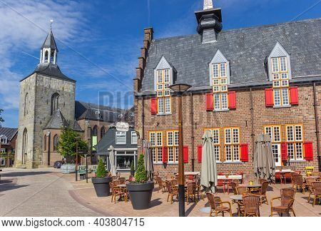 Tubbergen, Netherlands - May 26, 2020: Colorful Building And Church Tower In The Center Of Tubbergen