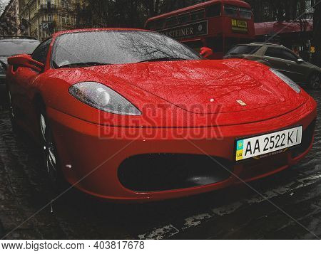 Kiev, Ukraine - April 10, 2011: Red Supercar Ferrari F430 In Raindrops. Ferrari In The City