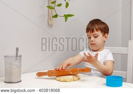 Little Boy Helps Mother To Cook  Making Homemade Coockies. Casual Lifestyle In Home Interior, Pretty