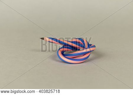 Flexible Pencil On A Light Background. Selective Focus