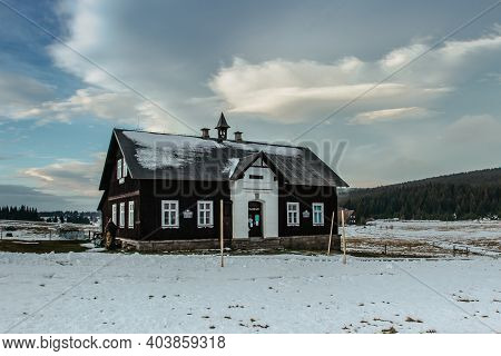 Jizerka, Czech Republic - December 5, 2020. Old Wooden House Used As Museum At The Jizerka Settlemen