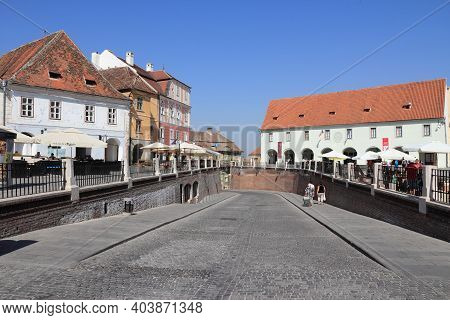 Sibiu, Romania - August 24, 2012: People Visit Old Town In Sibiu, Romania. Sibiu's Tourism Is Growin