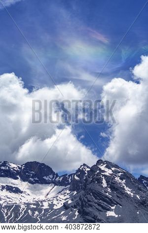 Iridescent Cloud Over The Road To Stelvio Pass, Sondrio Province, Lombardy, Italy, At Summer.
