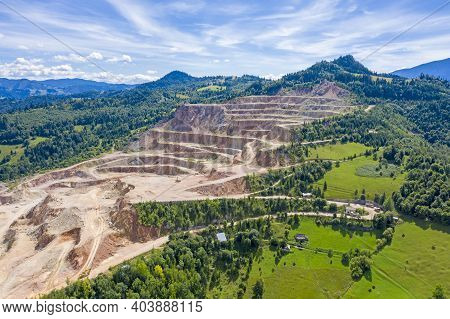 Aerial Panorama Of Cement Mining Quarry In Romanian Carpahians During Summer