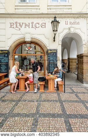 Prague, Czech Republic - July 24, 2017: Toruists Resting And Eating In A Pub Of Prague