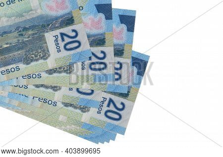 20 Mexican Pesos Bills Lies In Small Bunch Or Pack Isolated On White. Mockup With Copy Space. Busine
