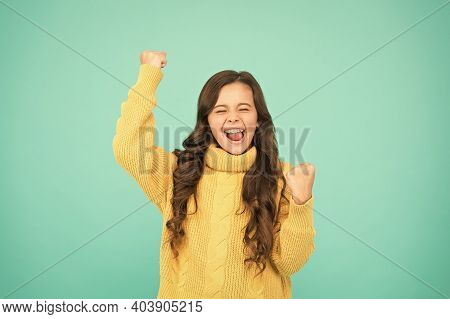 Adorable Smiling Girl Wear Yellow Sweater Turquoise Background. Positivity Concept. Good Vibes. Emot