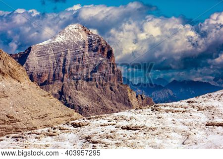  Dolomites in the snow. South Tyrol, Italy. The Pordoi Pass is part of the Dolomiti Superski ski resort. The scenic landscape