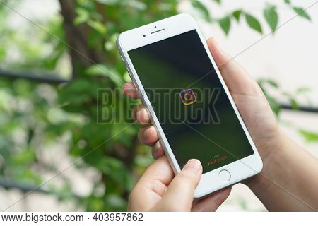 Chiang Mai, Thailand -aug.1,2020:woman Holds Apple Iphone 8plus With Instagram Application On The Sc