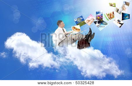 Businessman on the cloud. Internet concept