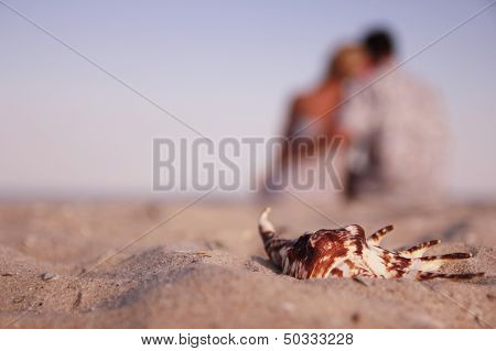 Couple In Love On The Shore Of The Sea