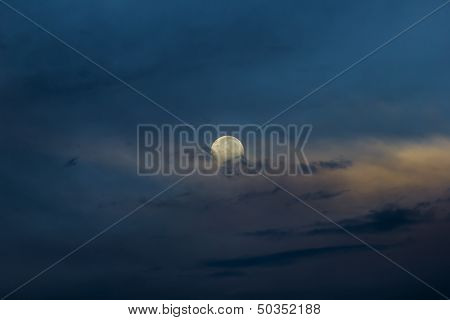Full moon at sunrise