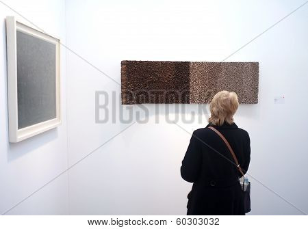 Visitor viewing art