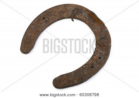 Old Rusty And Worn Horseshoe Isolated On White