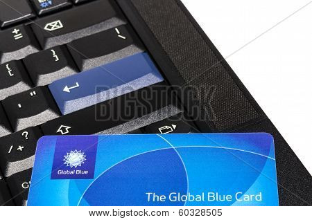 Global Blue Plastic Card On Black Thinkpad Keyboard