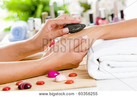 Close up of process of hand massage at beauty salon
