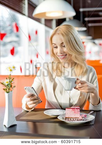 Young Woman In Cafe