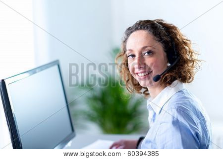 portrait of a beautiful young woman telephone operator