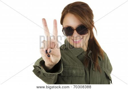 Portrait of beautiful young girl wearing green military style jacket