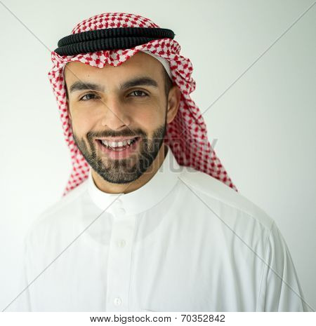 Saudi Arabian young businessman posing