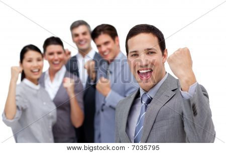Successful Business Team Punching The Air In Celebration